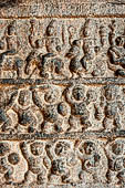 The great Chola temples of Tamil Nadu - The Airavatesvara temple of Darasuram. Pilasters inside the interior of the mandapa are decorated with small panels illustrating mythological stories in bas-reliefs. 